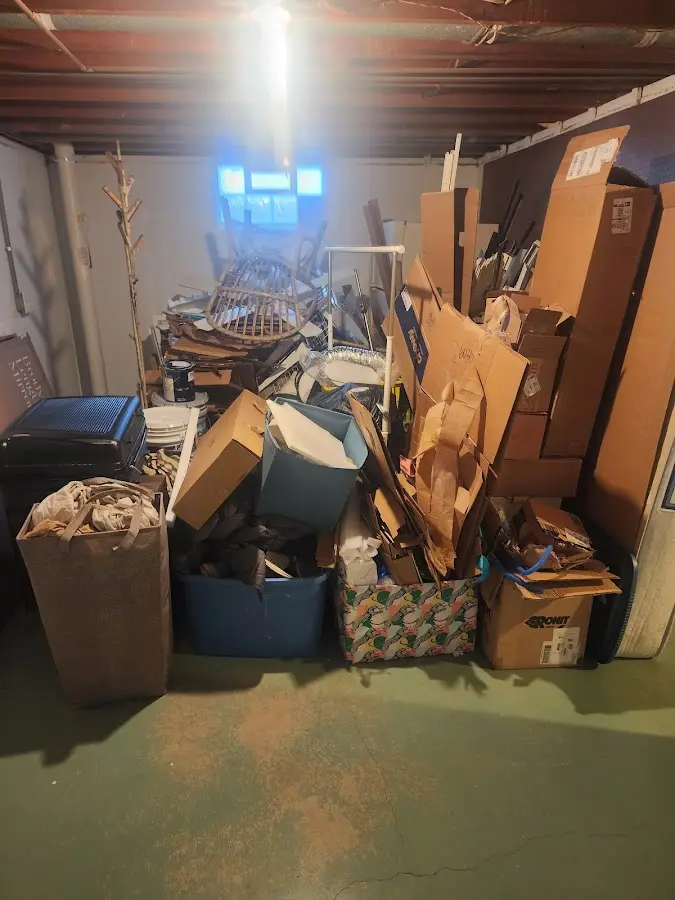 Roll-off dumpster container at job site for 6 Yard Dumpster Rental in Kennebunkport